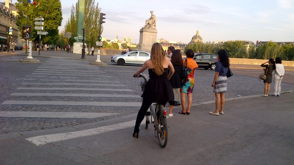 Cyclist at Pont du Carrousel