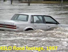 Picture of car floating in South Dakota flood, 1997