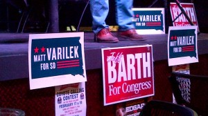 Campaign signs for Matt Varilek and Jeff Barth