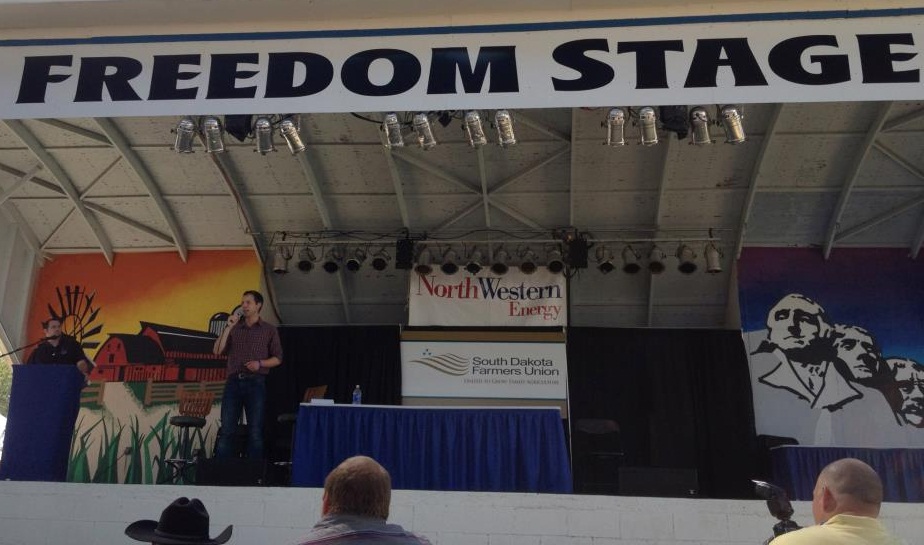 Matt Varilek debates Kristi Noem's empty chair at the South Dakota State Fair, September 1, 2012
