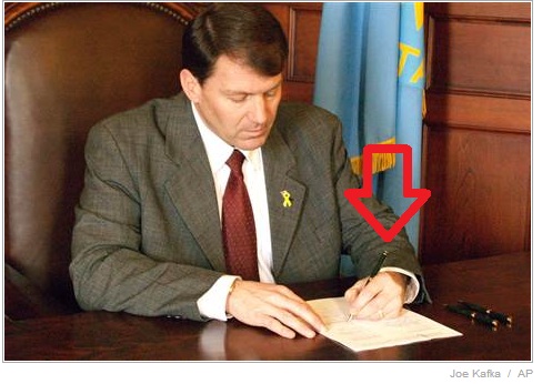 mike signs 2006 abortion ban