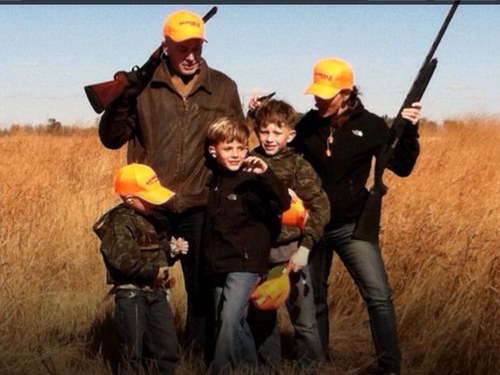 Annette Bosworth with family and shotguns, Twitter profile photo, downloaded 2013.06.11