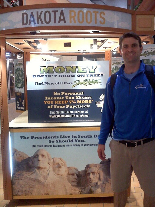 Todd Schlekeway at Dakota Roots kiosk, Mall of America, 2013.06.01, from Twitter