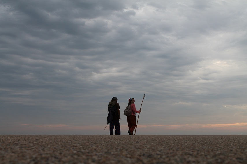 Duderman and Snow walk toward the vast South Dakota horizon, August 27, 2013. (Photo by Bret Clanton) 